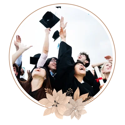 All worth the effort shot of a group of students throwing their hats in the air on graduation day