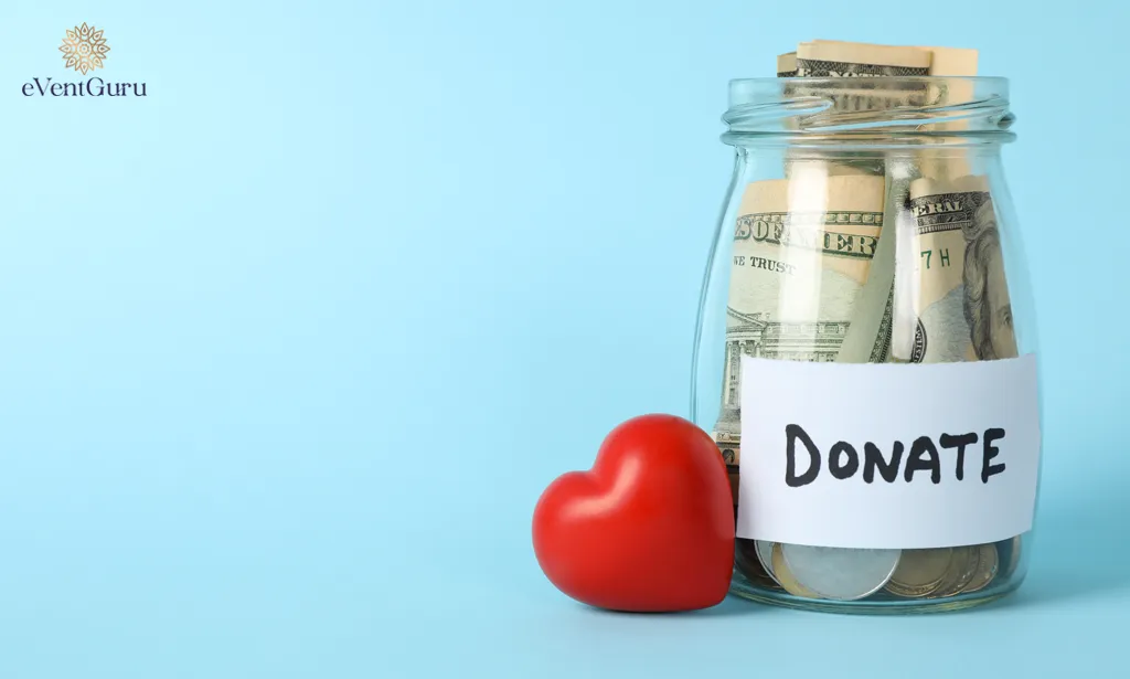 A glass jar with the text donate and a heart on a blue background