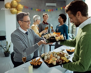 Close-up of office colleagues serving food