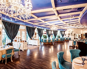 Restaurant hall with turquoise chairs