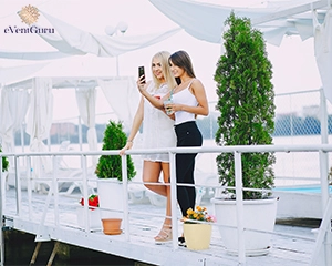 two female near the sea and clicking picture