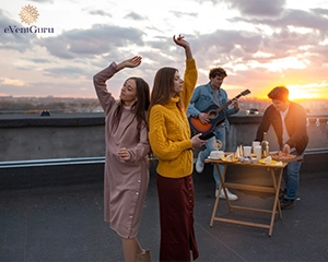 Friends enjoying rooftop party